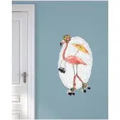 VAN IKKE Muursticker Flamingo op rolschaatsen