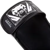 Venum Elite scheenbeschermer zwart/wit