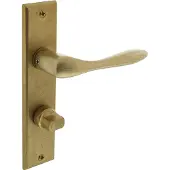 Intersteel Deurkruk Banaan op schild met toilet-/badkamersluiting 63/8 mm - messing getrommeld