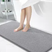 Unyqoos Zachte en absorberende badmat met antisliplaag voor badkamercomfort