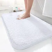Unyqoos Zachte en waterabsorberende badmat met antislip en hoogpolige microvezels