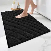 Unyqoos Zwarte waterabsorberende badmat met antislip voor badkamercomfort