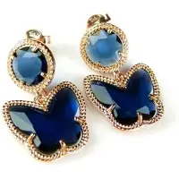 Sophie Zilveren oorringen oorbellen roos goud verguld Model Butterfly gezet met donker blauwe stenen