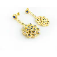 Sophie Model Blue Flower zilveren oorringen geel goud verguld gezet met blauwe steentjes