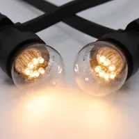 LumenXL Lichtsnoer - 25 meter met 50 lampen - 0,7W LEDs op stokjes - kleur van gloeilamp (2650K)