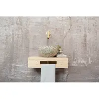 Saniclear Seba fonteinset met eiken plank, zwart-witte terrazzo waskom en gouden kraan voor in het toilet