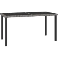 vidaXL Tuintafel 140x70x73 cm poly rattan grijs
