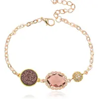 Deja Jewels Goudkleurige verstelbare dames armband met roze glassteen