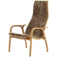 Swedese Lamino fauteuil en voetenbankje geolied eiken/schapenvacht Sahara (nogabruin)