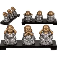 Out of the blue decoration figurines on wooden stand (horen, zien en zwijgen)