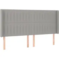 vidaXL Hoofdbord met randen 163x16x118/128 cm stof lichtgrijs