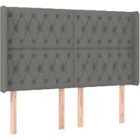 vidaXL Hoofdbord met randen 163x16x118/128 cm stof donkergrijs
