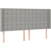 vidaXL Hoofdbord met randen 163x16x118/128 cm stof lichtgrijs