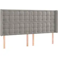 vidaXL Hoofdbord met randen 163x16x118/128 cm fluweel lichtgrijs