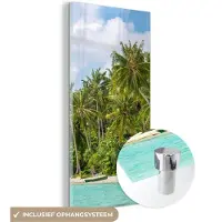 MuchoWow Glasschilderij 60x120 cm - Schilderij acrylglas - Palmboom - Zee - Tropisch - Foto op glas - Schilderijen