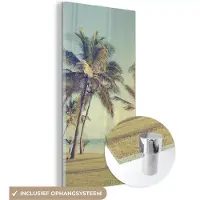 MuchoWow Glasschilderij 60x120 cm - Schilderij acrylglas - Zee - Palmboom - Zomer - Zon - Strand - Foto op glas - Schilderijen