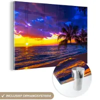 MuchoWow Glasschilderij - Wanddecoratie natuur - Zonsondergang - Paars - Zee - Palmboom - Foto op glas - Kamer decoratie - Acrylplaat - Glazen schilderij - Acrylglas - 90x60 cm - Wanddecoratie