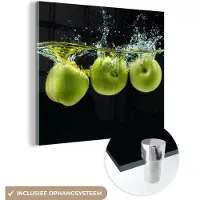 MuchoWow Glasschilderij 20x20 cm - Schilderij acrylglas - Appels - Fruit - Water - Zwart - Groen - Foto op glas - Schilderijen