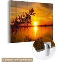 MuchoWow - Glasschilderij - Foto op glas - Zon - Water - Tak - Bladeren - Schilderij zonsondergang - Wanddecoratie - Schilderij glas - Acrylglas - 40x30 cm - Muurdecoratie - Schilderijen woonkamer