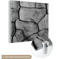 MuchoWow Glasschilderij - Zwart - Wit - Klei - Steen - 50x50 cm - Schilderij glas - Kamerdecoratie