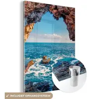 MuchoWow - Glasschilderij - Foto op glas - Schilderij - Zee - Grot - Kust - Rotsen - 60x80 cm - Acrylglas - Schilderijen op glas - Wanddecoratie - Schilderijen