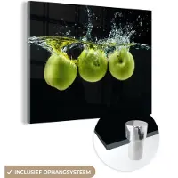 MuchoWow Glasschilderij 40x30 cm - Schilderij acrylglas - Appels - Fruit - Water - Zwart - Groen - Foto op glas - Schilderijen