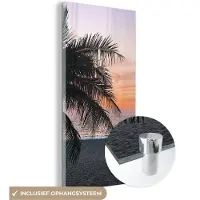 MuchoWow Glasschilderij 20x40 cm - Schilderij acrylglas - Palmboom - Strand - Zee - Avond - Foto op glas - Schilderijen
