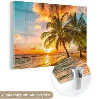 MuchoWow Glasschilderij - Wanddecoratie - Acrylplaat - Palmboom - Strand - Zee - Zonsondergang - Foto op glas - Schilderij glas - Wanddecoratie natuur - Acrylglas - 60x40 cm - Schilderijen woonkamer