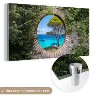 MuchoWow Glasschilderij 40x20 cm - Schilderij acrylglas - Zee - Boom - Tropisch - Doorkijk - Foto op glas - Schilderijen