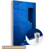 MuchoWow Glasschilderij 120x180 cm - Schilderij acrylglas - Blauw - Trap - Architectuur - Gebouw - Foto op glas - Schilderijen