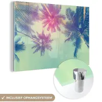 MuchoWow Glasschilderij 180x120 cm - Schilderij acrylglas - Palmbomen - Palmbladeren - Palm - Zomer - Tropisch - Foto op glas - Schilderijen