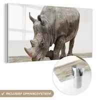 MuchoWow Glasschilderij 40x20 cm - Schilderij acrylglas - Neushoorn - Jongens - Wilde dieren - Kinderen - Meisjes - Dieren - Foto op glas - Schilderijen