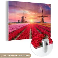 MuchoWow - Glasschilderij - Acrylglas - Bloemen - Windmolen - Tulpen - Zonsondergang - Landschap - Foto op glas - 120x80 cm - Schilderij bloemen - Schilderijen woonkamer - Wanddecoratie glas
