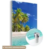 MuchoWow - Glasschilderij - Acrylglas - Foto op glas - Strand - Zee - Palmboom - 120x160 cm - Wanddecoratie glas - Glasschilderij strand - Glasschilderij natuur - Woonkamer