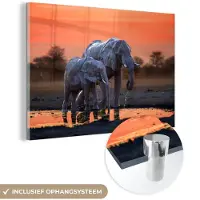 MuchoWow Glasschilderij 180x120 cm - Schilderij acrylglas - Olifant - Dieren - Zonsondergang - Water - Oranje - Foto op glas - Schilderijen