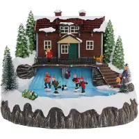 Merkloos Christmas Decoration kerstdorp huis met schaatsers- 29x28x23 cm - Kerstdorpen