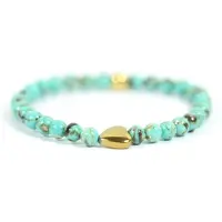 Heaven Eleven Dames - armband - turkoois - Goud - pyrite - hart - turquoise - 4mm - 17,5 cm -