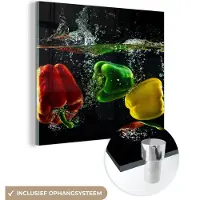 MuchoWow Glasschilderij 20x20 cm - Schilderij acrylglas - Paprika - Groente - Water - Zwart - Rood - Groen - Geel - Foto op glas - Schilderijen
