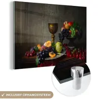 MuchoWow Glasschilderij 180x120 cm - Schilderij acrylglas - Rustiek - Tafel - Fruit - Stilleven - Beker - Foto op glas - Schilderijen