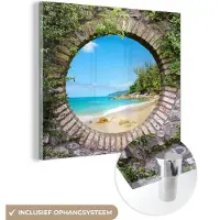 MuchoWow Glasschilderij 50x50 cm - Schilderij acrylglas - Strand - Zee - Doorkijk - Zomer - Foto op glas - Muurdecoratie woonkamer - Wanddecoratie slaapkamer - Schilderijen