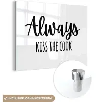 MuchoWow Glasschilderij 40x30 cm - Schilderij acrylglas - Quote - 'Always kiss the cook' - Liefde - Wit - Zwart - Foto op glas - Muurdecoratie woonkamer - Wanddecoratie slaapkamer - Schilderijen