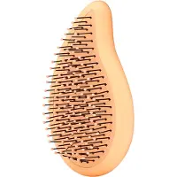 The Wet Brush Go green palm detangler orange coconut oil