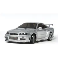 Tamiya RC Driftauto 1:10, TT-02D, NISMO R34 GT-R Z-Tune, bouwdoos voor drift