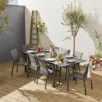 Sweeek Chicago set, 1 tafel met een verlengstuk, 2 fauteuils, 6 stoelen uit aluminium en textileen