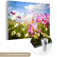 MuchoWow Glasschilderij 180x120 cm - Schilderij acrylglas - Bloemen - Wei - Paars - Gras - Wit - Wolken - Blauw - Foto op glas - Muurdecoratie woonkamer - Wanddecoratie slaapkamer - Schilderijen