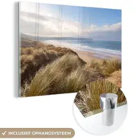 MuchoWow Glasschilderij 60x40 cm - Schilderij acrylglas - Duin - Strand - Water - Foto op glas - Muurdecoratie woonkamer - Wanddecoratie slaapkamer - Schilderijen