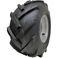Wanda 18x9,50-8 band met open midden, profielblokken en rotovator-noppen voor gebruik in plantages, gemonteerd op een 25 mm kogellager