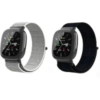 Strap-it Bundel van 2 Nylon banden - Zwart & Zeeschelp - Geschikt voor Fitbit Versa 3 / Versa 4 / Sense 2 - Geweven Nylon band - Zachte Nylon band - Horlogeband / Polsband / Armband