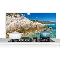 KitchenYeah Spatscherm keuken 120x60 cm - Kookplaat achterwand Zee - Klif - Zomer - Tropisch - Muurbeschermer - Spatwand fornuis - Hoogwaardig aluminium