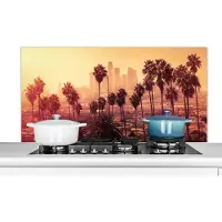 KitchenYeah Spatscherm keuken 120x60 cm - Kookplaat achterwand Palmboom - Skyline - Zonsondergang - Architectuur - Muurbeschermer - Spatwand fornuis - Hoogwaardig aluminium